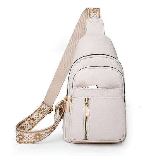 Women's Faux Leather Sling Bag with Patterned Strap and Gold-Tone Zippers