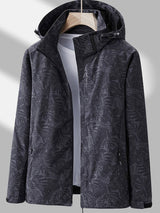 Women's Hooded Outdoor Jacket with Leaf Print and Zip Closure