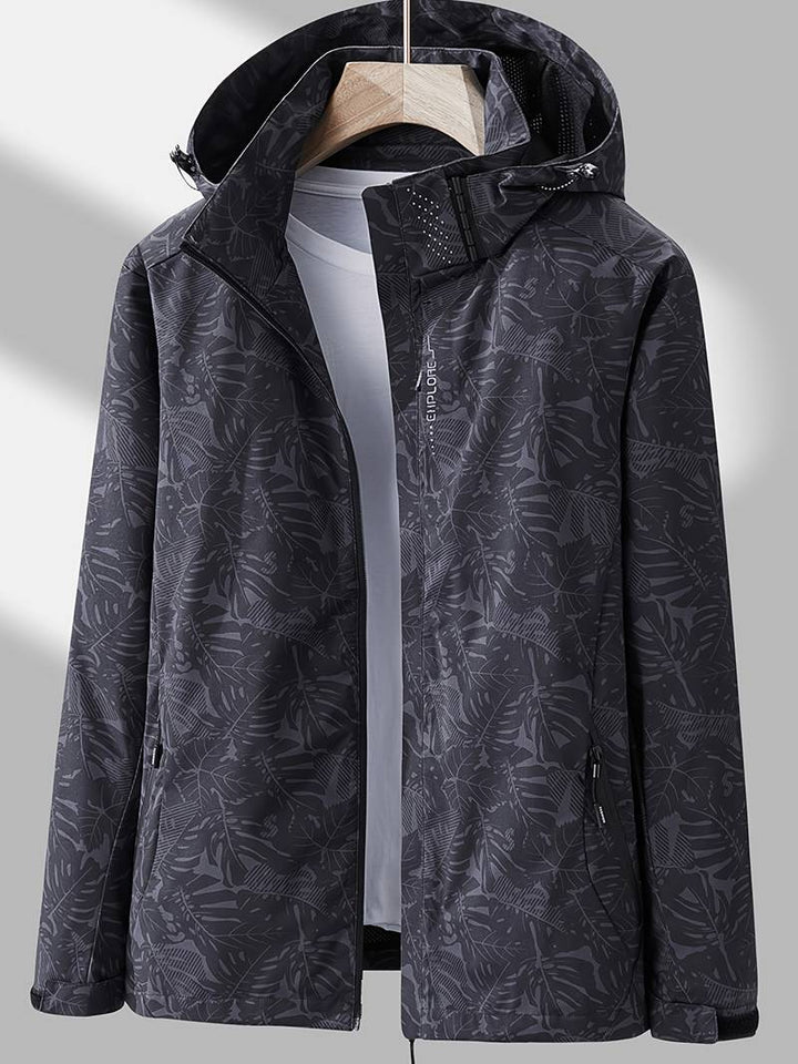 Women's Hooded Outdoor Jacket with Leaf Print and Zip Closure