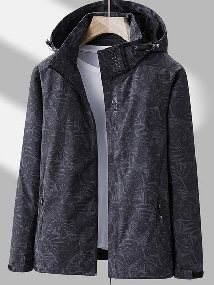 Women's Hooded Outdoor Jacket with Leaf Print and Zip Closure