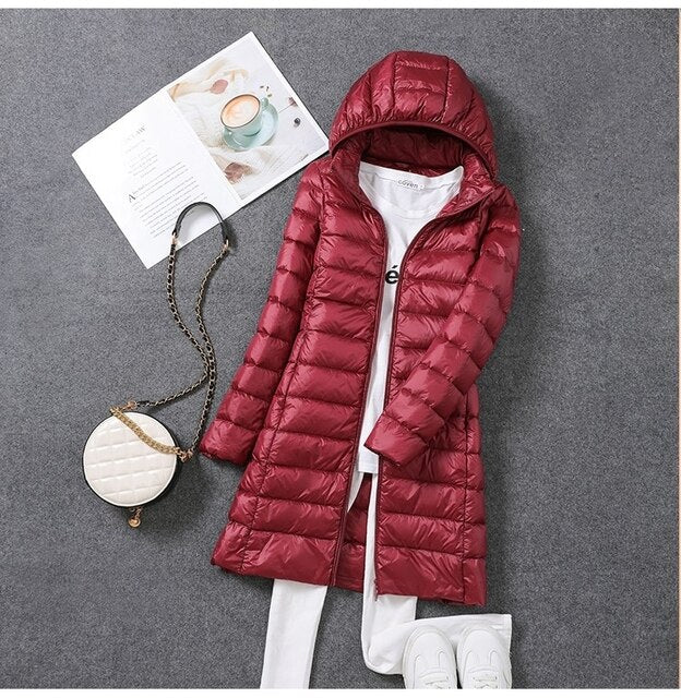 Women's Long Puffer Jacket with Detachable Hood and Zip Closure