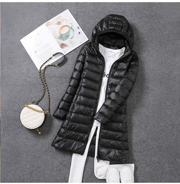 Women's Long Puffer Jacket with Detachable Hood and Zip Closure