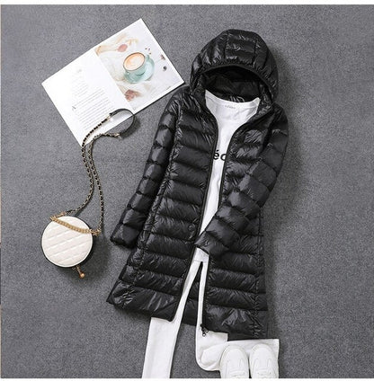 Women's Long Puffer Jacket with Detachable Hood and Zip Closure
