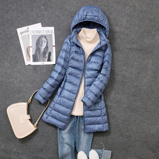 Women's Long Puffer Jacket with Detachable Hood and Zip Closure