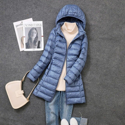 Women's Long Puffer Jacket with Detachable Hood and Zip Closure