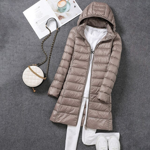 Women's Long Puffer Jacket with Detachable Hood and Zip Closure