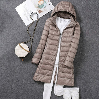 Women's Long Puffer Jacket with Detachable Hood and Zip Closure