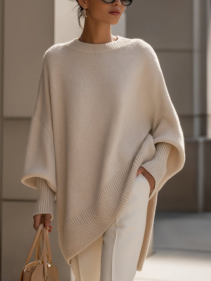 Women's Oversized Batwing Sweater with Round Neck and Asymmetric Hem
