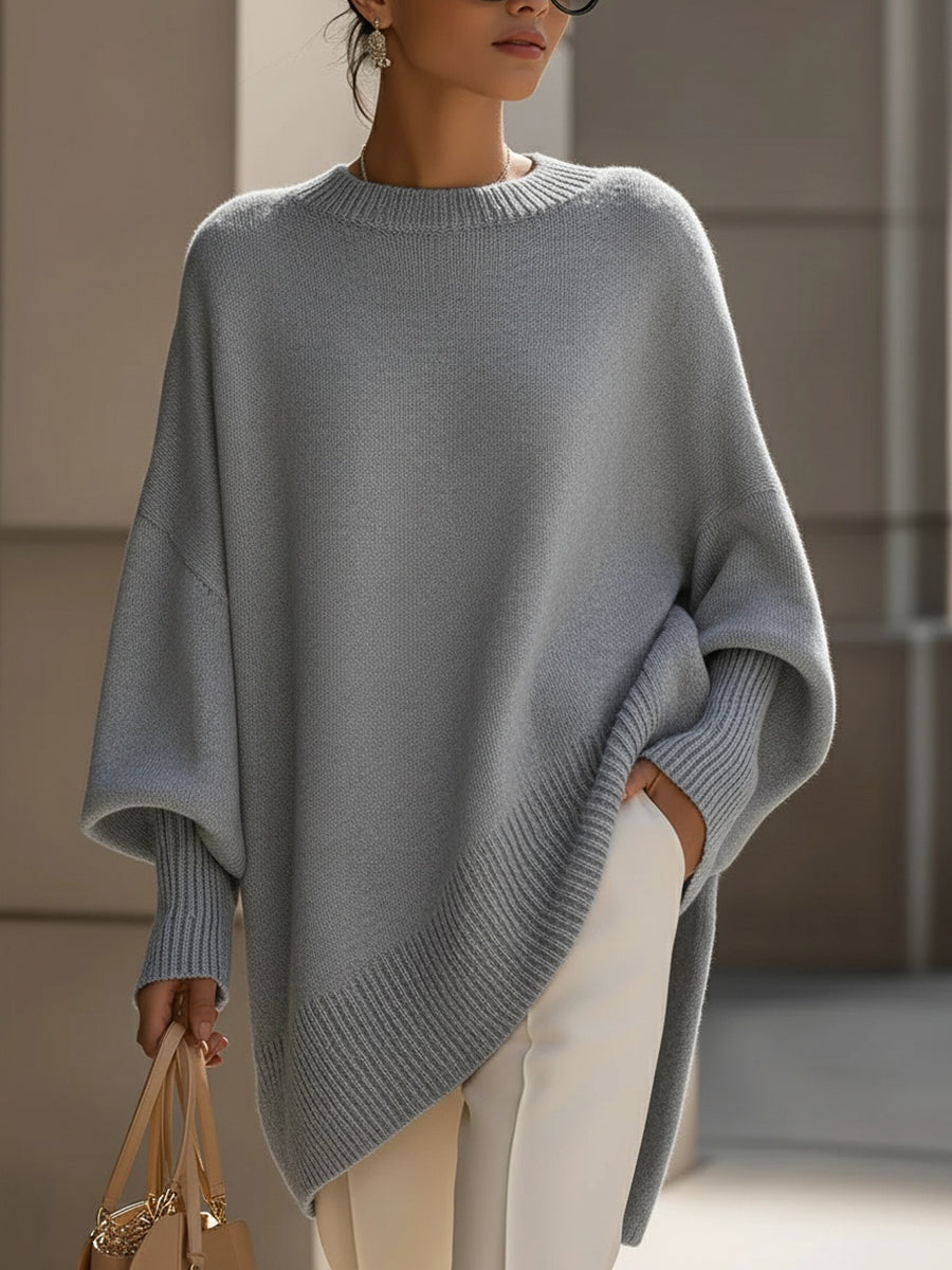 Women's Oversized Batwing Sweater with Round Neck and Asymmetric Hem